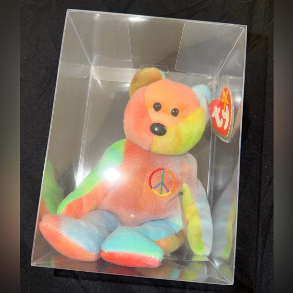 Ty Multicolor Peace Bear w/ RETIRED P.V.C. pellets 

MINT CONDITION
